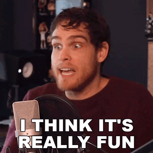 A Man Speaking Into A Microphone With The Words I Think It 'S Really Fun GIF