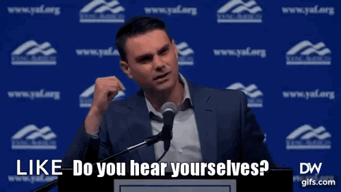 A Man Speaking Into A Microphone With The Words Like Do You Hear Yourselves On The Bottom GIF