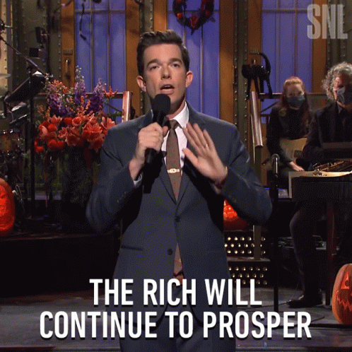 A Man Speaking Into A Microphone With The Words The Rich Will Continue To Prosper On The Bottom GIF