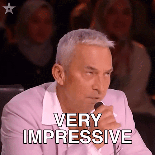 Man Speaking Into Microphone With Very Impressive Text GIF