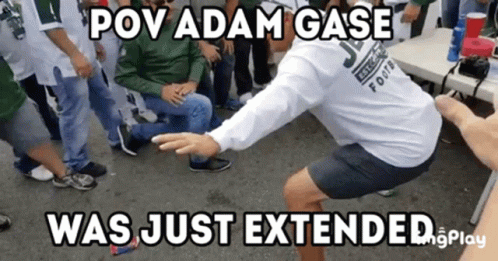 A Man Squatting In Front Of A Group Of People With The Caption Pov Adam Case Was Just Extended GIF