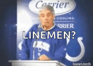 A Man Standing At A Podium With The Words Linemen Written Above Him GIF