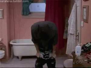 A Man Standing In A Bathroom With The Website Sarafena.tumblr.com On The Bottom Right GIF