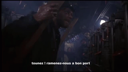 a man standing in a dark room with the words " c'est un ordre " written on the bottom