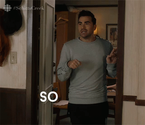 Man Standing In Doorway With So Text GIF