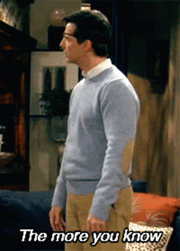 A Man Standing In A Living Room With The Words " The More You Know " On The Bottom GIF