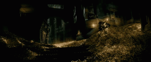 A Man Standing In A Pile Of Gold With The Words Beyond Sorrow Written On The Bottom GIF