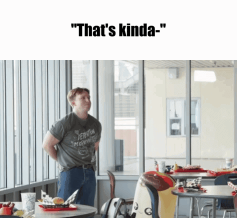 A Man Standing In A Restaurant With The Words " That 'S Kinda " GIF