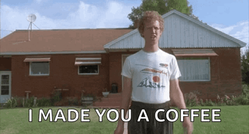 A Man Standing In Front Of A Brick House With The Words I Made You A Coffee GIF