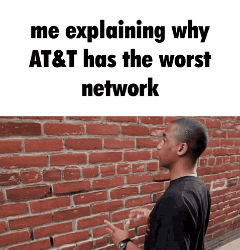 A Man Standing In Front Of A Brick Wall With The Words " Me Explaining Why At & T Has The Worst Network " GIF