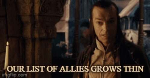A Man Standing In Front Of A Candle With The Words Our List Of Allies Grows Thin On The Bottom GIF