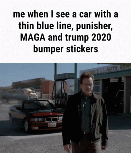 a man standing in front of a car with a thin blue line punisher maga and trump 2020 bumper stickers on it