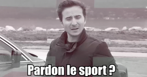 A Man Standing In Front Of A Car With The Words Pardon Le Sport Written On The Bottom GIF