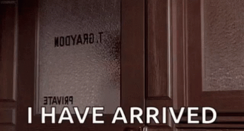Man In Front Of Door Saying I Have Arrived GIF