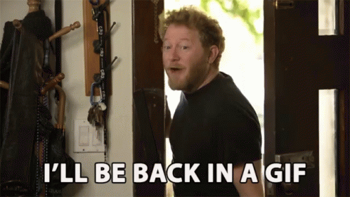 A Man Standing In Front Of A Door With The Words I 'Ll Be Back In A GIF