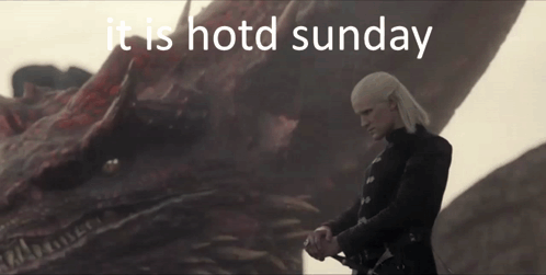 A Man Standing In Front Of A Dragon With The Words " It Is Hotd Sunday " Below Him GIF