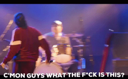 Man Standing By Drum Set With F Word GIF