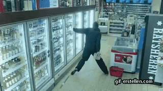 A Man Standing In Front Of A Fridge That Says Rat Sherpa On It GIF
