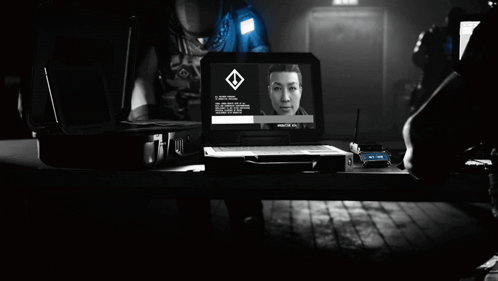 A Man Standing In Front Of A Laptop That Says Level 1 On It GIF