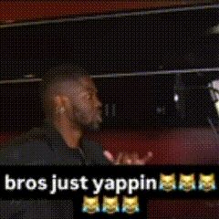 A Man Standing In Front Of A Microphone With The Words " Bros Just Yapping " Written On The Bottom GIF