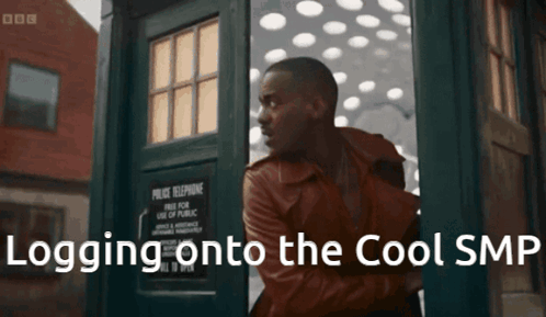 A Man Standing In Front Of A Police Box With The Words Logging Onto The Cool Smf Written Below Him GIF