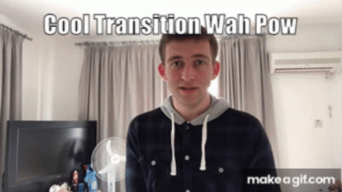 A Man Standing In Front Of A Television With The Words Cool Transition Wah Pow GIF