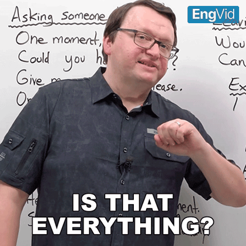 a man standing in front of a white board with the words is that everything written on it