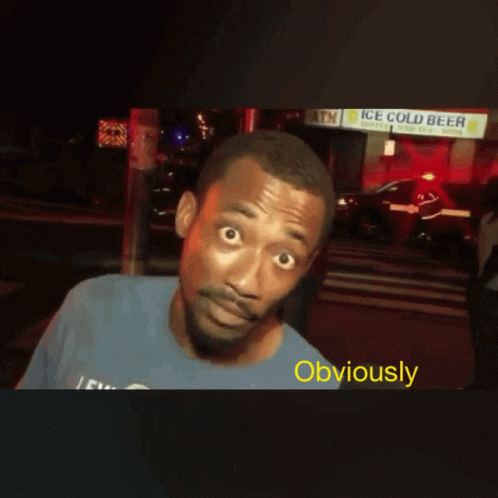 A Man Standing In Front Of An Ice Cold Beer Store GIF