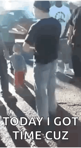 A Man Standing Next To A Baby With The Words `` Today I Got Time Cuz '' . GIF