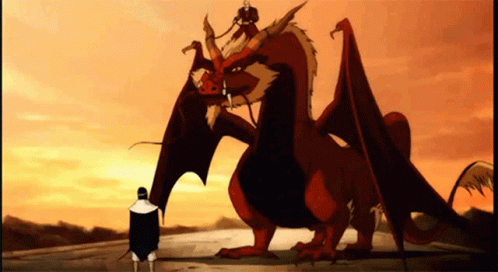 A Man Standing Next To A Large Red Dragon With Wings GIF
