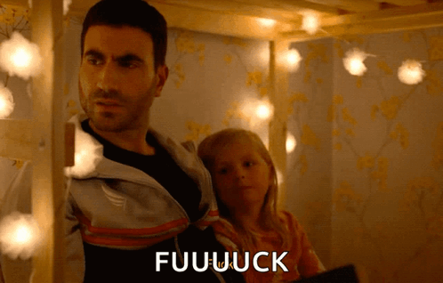 A Man Standing Next To A Little Girl With The Word Fuuuuck Written On The Bottom GIF