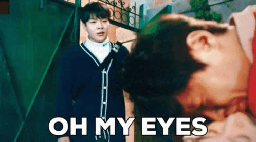 A Man Standing Next To A Woman With The Words Oh My Eyes Written On The Bottom GIF