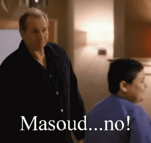A Man Standing Next To Another Man With The Words Masoud.no Written On The Bottom GIF