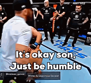 A Man Standing On A Boxing Ring With The Words It 'S Okay Son Just Be Humble GIF