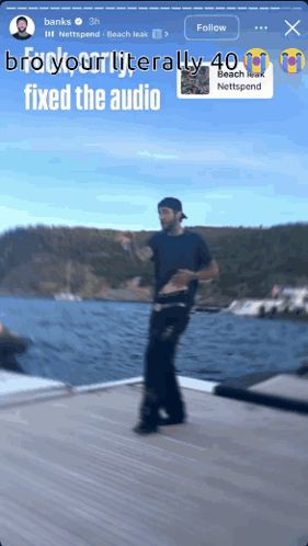 A Man Standing On A Dock With The Words " Bro Your Literally 40 Fixed The Audio " Above Him GIF