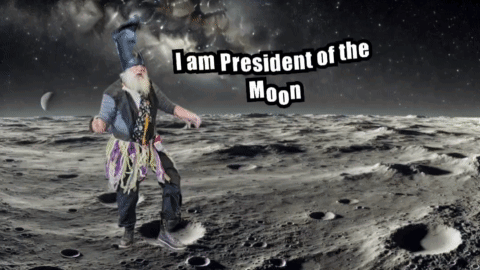 A Man Standing On The Moon With The Words I Am President Of The Moon GIF
