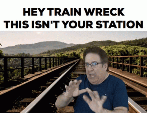 A Man Standing On Train Tracks With The Words Hey Train Wreck This Is N't Your Station GIF