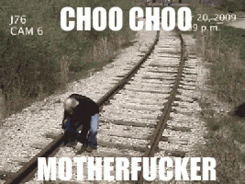 A Man Standing On Train Tracks With The Words Motherfucker On The Bottom GIF