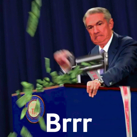 A Man Stands Behind A Podium With The Word Brrr Written On It GIF