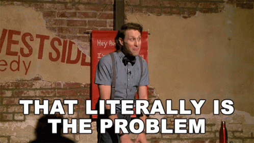 Man Standing In Front Of Brick Wall That Is The Problem GIF