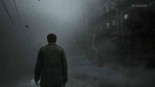A Man Stands In Front Of A Building That Says Konami On The Bottom GIF