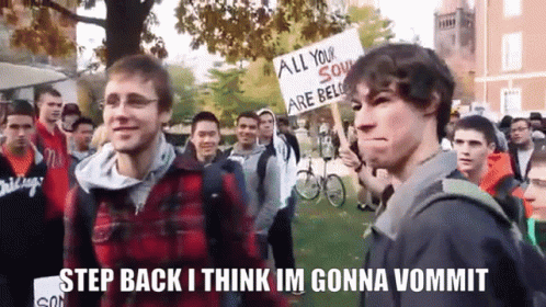 A Man Stands In Front Of A Crowd Holding A Sign That Says All Your Soul Are Belle GIF