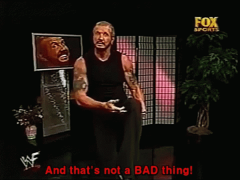 A Man Stands In Front Of A Fox Sports Advertisement GIF