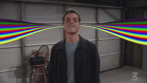 A Man Stands In Front Of A Garage Door With A Fox 5 Logo GIF