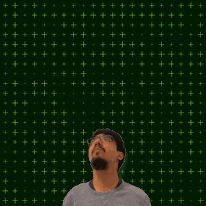 A Man Stands In Front Of A Green Background With The Number 16 On It GIF