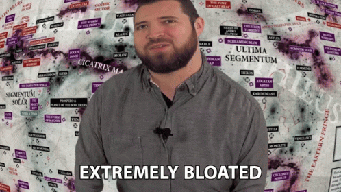 A Man Stands In Front Of A Map That Says Extremely Bloated GIF