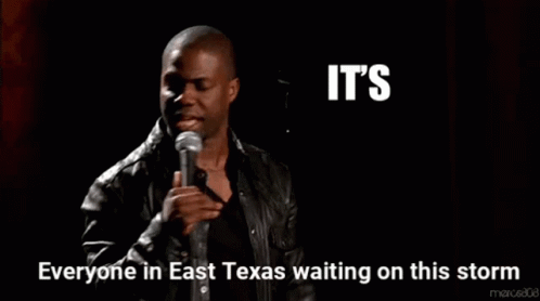 A Man Stands In Front Of A Microphone With The Words " It 'S About To Go Down " Above Him GIF
