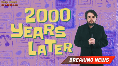 A Man Stands In Front Of A Purple Background With 2000 Years Later Written On It GIF