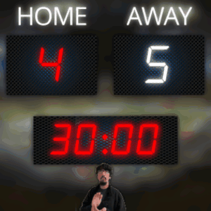 A Man Stands In Front Of A Scoreboard That Says Home 45 Away 30 GIF