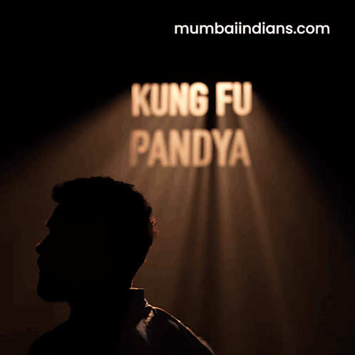 A Man Stands In Front Of A Sign That Says Kung Fu Panda GIF